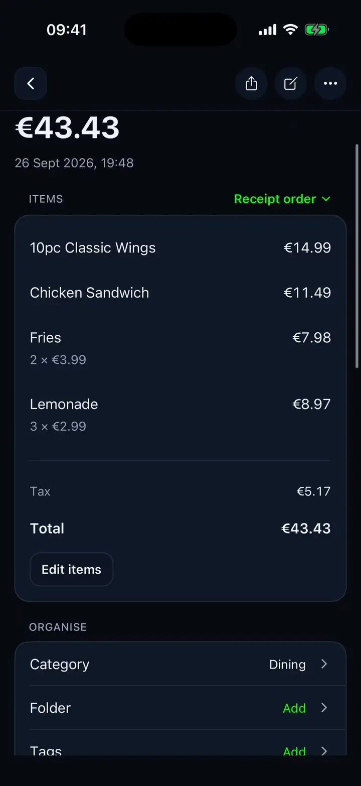 A Wingstop receipt in Tab: the shop, the total and each item, read from the photo